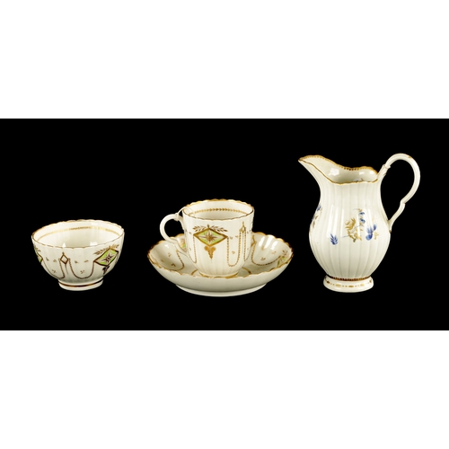 301 - A RARE CAUGHLEY PORCELAIN TRIO CIRCA 1780 decorated with gilt swags TOGETHER WITH A SIMILAR CREAM JU... 