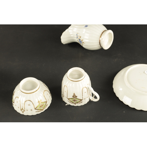 301 - A RARE CAUGHLEY PORCELAIN TRIO CIRCA 1780 decorated with gilt swags TOGETHER WITH A SIMILAR CREAM JU... 