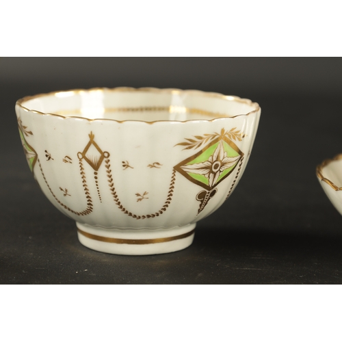 301 - A RARE CAUGHLEY PORCELAIN TRIO CIRCA 1780 decorated with gilt swags TOGETHER WITH A SIMILAR CREAM JU... 