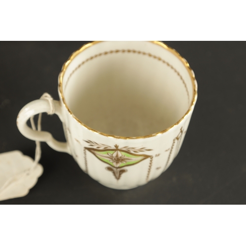 301 - A RARE CAUGHLEY PORCELAIN TRIO CIRCA 1780 decorated with gilt swags TOGETHER WITH A SIMILAR CREAM JU... 