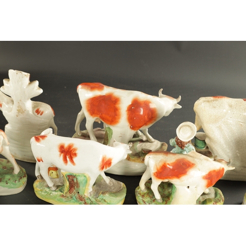 310 - A COLLECTION OF SEVEN MID 19TH CENTURY STAFFORDSHIRE PORCELAIN FIGURAL COW GROUPS (19cm high and sma... 