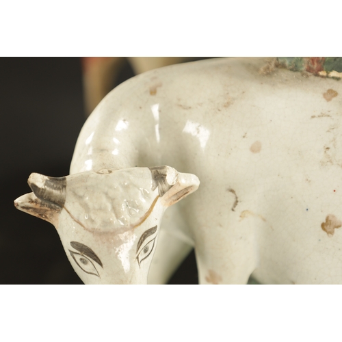 312 - TWO PAIRS OF STAFFORDSHIRE SPILL VASES WITH COWS AND CALVES CIRCA 1870, ALONG WITH TWO SIMILAR FIGUR... 