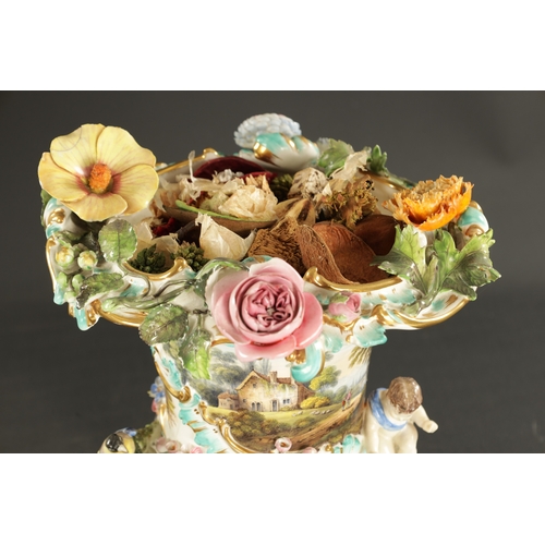 314 - A COALBROOKDALE PORCELAIN VASE ENCRUSTED WITH FLOWERS AND BIRDS WITH RURAL LANDSCAPES (27cm high)