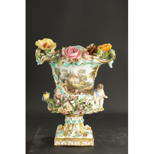 314 - A COALBROOKDALE PORCELAIN VASE ENCRUSTED WITH FLOWERS AND BIRDS WITH RURAL LANDSCAPES (27cm high)