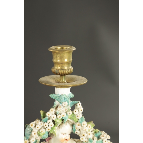 316 - A PAIR OF MID 18TH CENTURY DERBY PORCELAIN CANDLESTICKS of cherubs (26cm high )