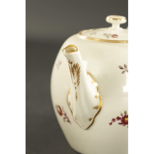 317 - A LATE 18TH CENTURY WORCESTER PORCELAIN TEAPOT painted with flowers (13cm high)