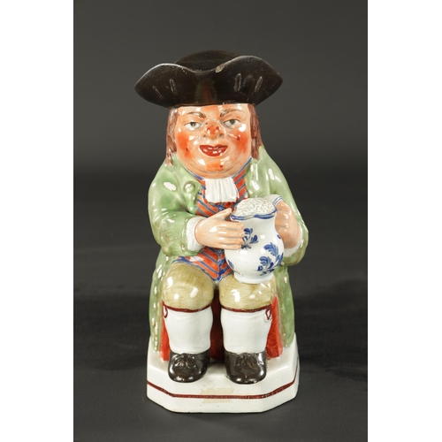 322 - AN EARLY 19TH CENTURY WALTON TOBY JUG (26.5cm high)