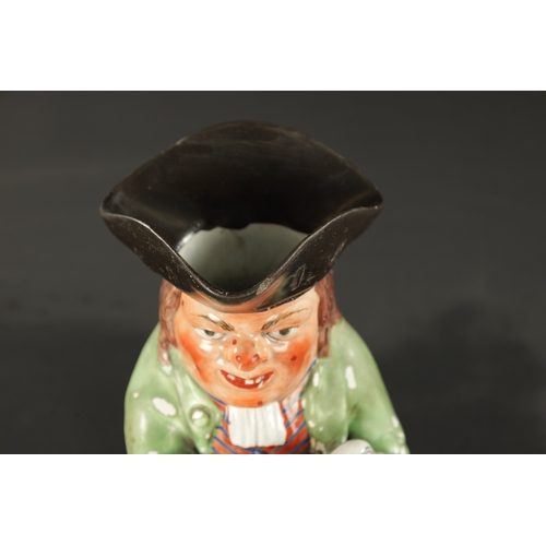 322 - AN EARLY 19TH CENTURY WALTON TOBY JUG (26.5cm high)