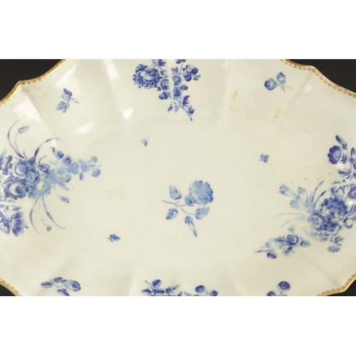 33 - A WORCESTER PORCELAIN DISH PAINTED WITH DRY BLUE FLOWERS CIRCA 1770 together with A WORCESTER COFFEE... 