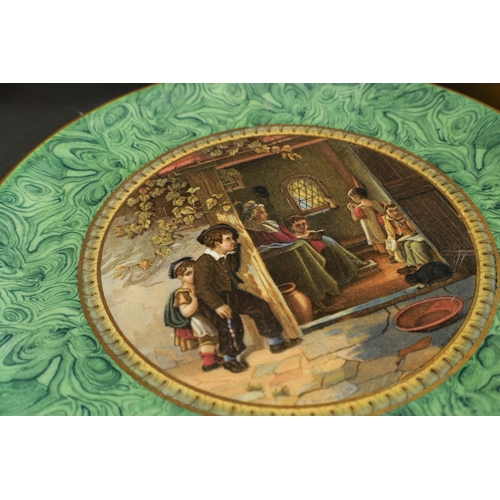 339 - A PAIR OF PRATTWARE PLATES CIRCA 1870 - the hop queen TOGETHER WITH TWO OTHER PLATES (24cm diameter)