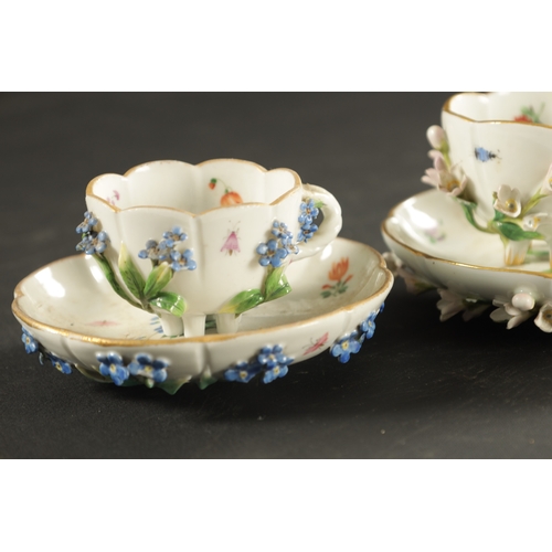 34 - THREE MID 19TH CENTURY MEISSEN PORCELAIN CUP AND SAUCERS encrusted and painted with flowers and inse... 