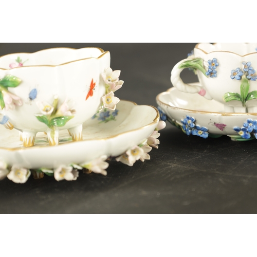 34 - THREE MID 19TH CENTURY MEISSEN PORCELAIN CUP AND SAUCERS encrusted and painted with flowers and inse... 