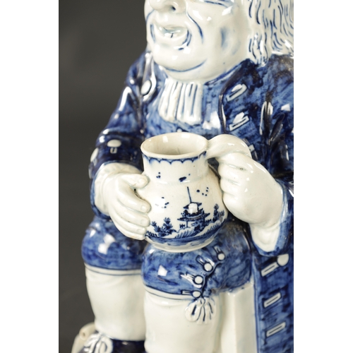 341 - AN EARLY 19TH CENTURY STAFFORDSHIRE TOBY JUG (26cm high)