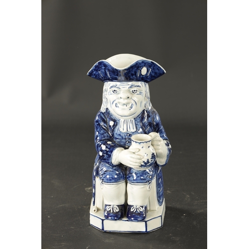 341 - AN EARLY 19TH CENTURY STAFFORDSHIRE TOBY JUG (26cm high)