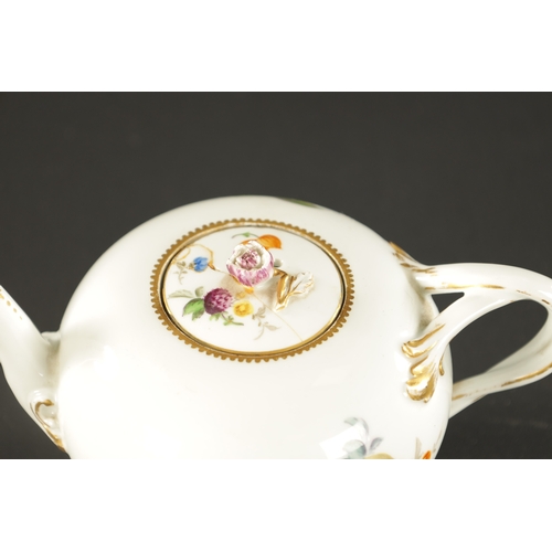 351 - A LATE 18TH CENTURY MEISSEN TEAPOT with painted fruits and floral decoration (18cm wide 11cm high )