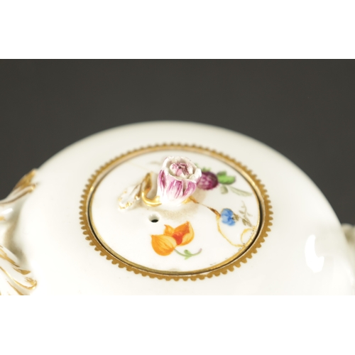 351 - A LATE 18TH CENTURY MEISSEN TEAPOT with painted fruits and floral decoration (18cm wide 11cm high )