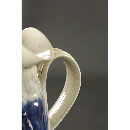 352 - AN EARLY 19TH CENTURY STAFFORDSHIRE TOBY JUG (25cm high)