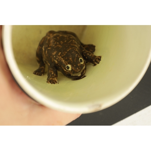 356 - TWO LATE 18TH CENTURY YORKSHIRE CREAMWARE FROG MUGS one inscribed 'let brotherly love continue' and ... 