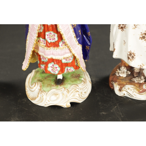 373 - A COLLECTION OF FIVE LATE 19TH CENTURY CONTINENTAL PORCELAIN FIGURES comprising a pair of Volschstat... 