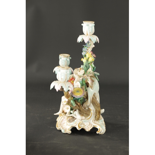 376 - A 19TH CENTURY MEISSEN THREE BRANCH FIGURAL CANDELABRA (30cm high)