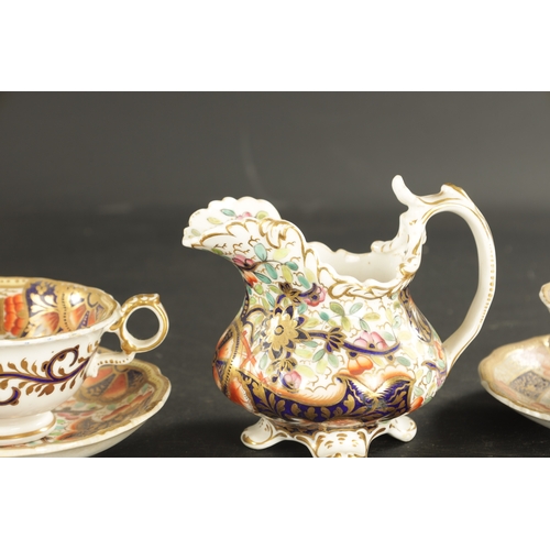 380 - TWO ENGLISH PORCELAIN TRIOS AND A CREAM JUG CIRCA 1840 painted in imari colours with flowering plant... 