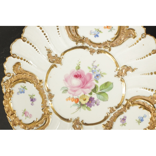 390 - TWO LATE 19TH CENTURY MEISSEN PORCELAIN PLATES one painted with flowers, the other painted with bird... 