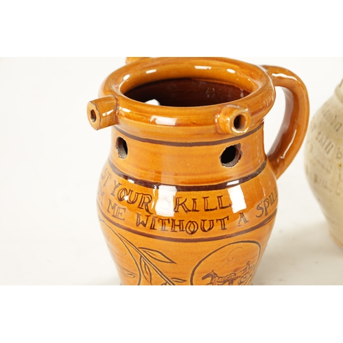 394 - TWO LATE 19TH CENTURY STONEWARE PUZZLE JUGS along with Lostweithel puzzle jug (22cm high and smaller... 