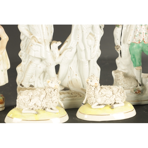 40 - A COLLECTION OF ENGLISH PORCELAIN a Staffordshire figure group old land syne, and a group of smith a... 