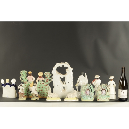 40 - A COLLECTION OF ENGLISH PORCELAIN a Staffordshire figure group old land syne, and a group of smith a... 