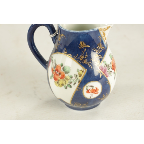 405 - A WORCESTER SPARROW BEAK JUG painted with flowers on an underglaze blue ground (8.8cm high)