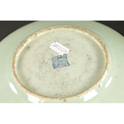 411 - A NANKING CARGO CHINESE PORCELAIN DISH painted in blue with a river landscape along with A SOWANKALO... 