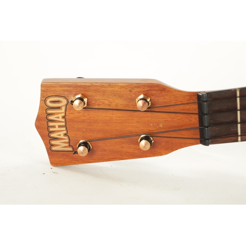 418 - A FRESHMAN TWELVE STRING ACOUSTIC GUITAR AND A MAHALO UKULELE the guitar with faux tortoiseshell inl... 