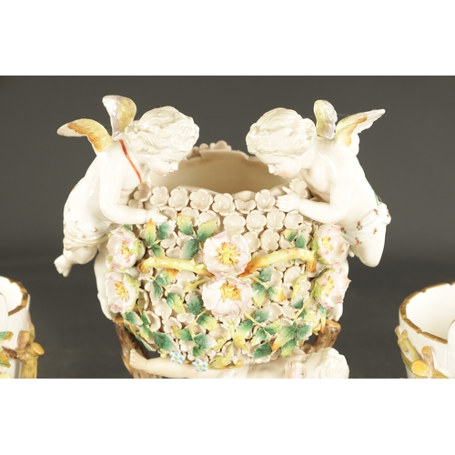 42 - FOUR PIECES OF MID 19TH CENTURY CONTINENTAL PORCELAIN comprising a pair of John Bevington vases of c... 