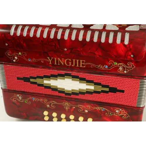 424 - A COLLECTION OF FOUR CASED ACCORDIONS comprising of a Yingjie, a Selmer Invicta, a Chiusarli, and a ... 