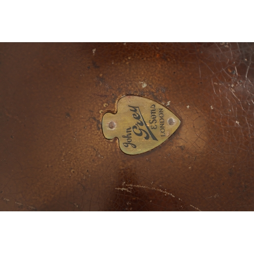 427 - A VINTAGE CASED BANJO BY JOHN GRAY & SONS, LONDON with instruction label to case. (56cm long)