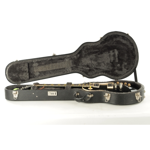 428 - A GIBSON LES PAUL 1960 CLASSIC ELECTRIC GUITAR in black with cream scratchboard and rosewood fingerb... 