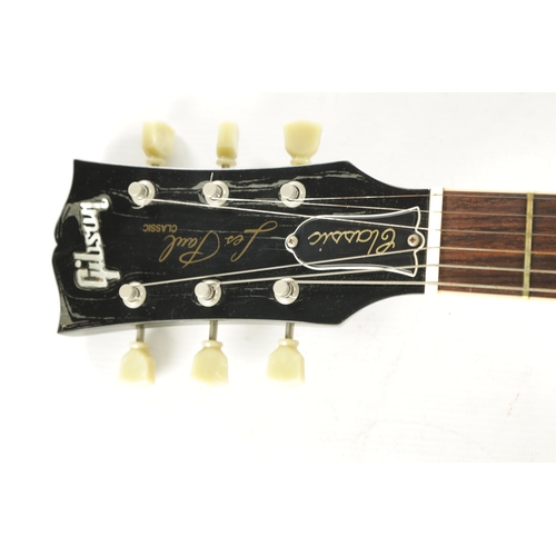 428 - A GIBSON LES PAUL 1960 CLASSIC ELECTRIC GUITAR in black with cream scratchboard and rosewood fingerb... 