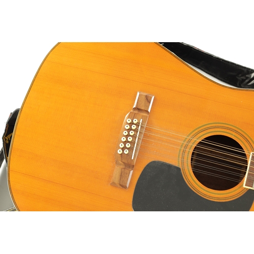 429 - A TWELVE STRING WASHBURN ACOUSTIC GUITAR with a spruce top and rosewood back. (109cm long)