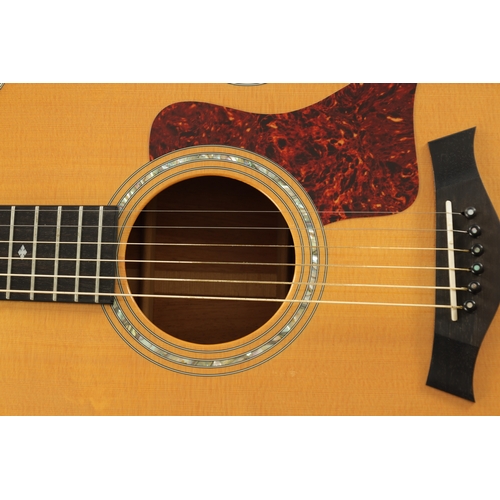 435 - A TAYLOR GRAND PACIFIC ACOUSTIC GUITAR with abalone inlay and faux tortoiseshell scratch board in ha... 