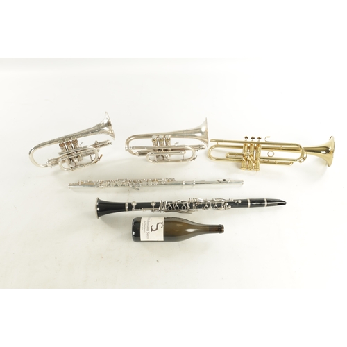 436 - A COLLECTION OF FIVE WIND INSTRUMENTS comprising of a Mistral flute, Selmer 1400 clarinet, a Boosey ... 