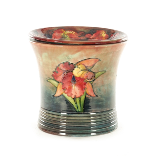 44 - A 1930/40S MOORCROFT FLAMBÉ WARE LARGE JARDINIERE with ribbed foot and flared body, incised and deco... 