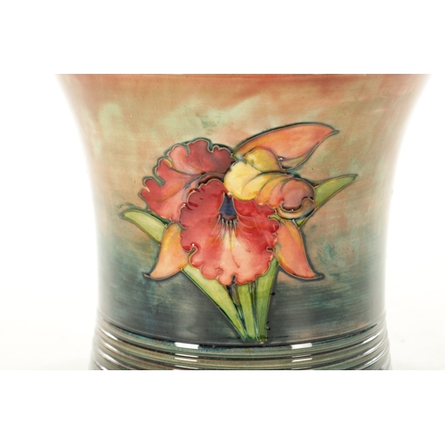 44 - A 1930/40S MOORCROFT FLAMBÉ WARE LARGE JARDINIERE with ribbed foot and flared body, incised and deco... 