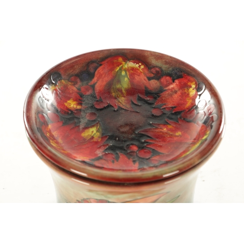 44 - A 1930/40S MOORCROFT FLAMBÉ WARE LARGE JARDINIERE with ribbed foot and flared body, incised and deco... 