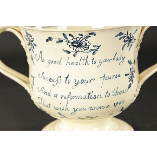 48 - A RARE LATE 18TH CENTURY LEEDS CREAMWARE LOVING CUP DATED 1780 (28cm high 18.5cm wide)