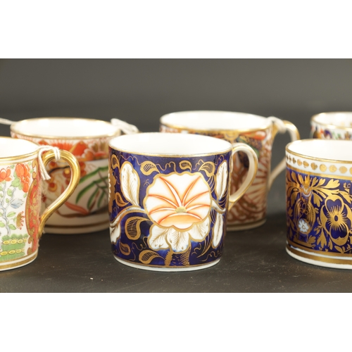 65 - A COLLECTION OF TEN COALPORT COFFEE CANS CIRCA 1810 with elaborate enamel and gilt decoration. (6.3c... 