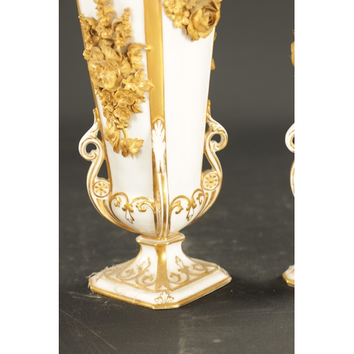 87 - A PAIR OF LATE 19TH CENTURY ROYAL CROWN DERBY VASES with gilt swags of flowers (23cm high)