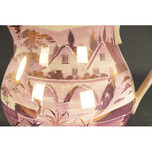 91 - A LARGE MID 19TH CENTURY LUSTRE JUG painted with rural landscape (28cm high)