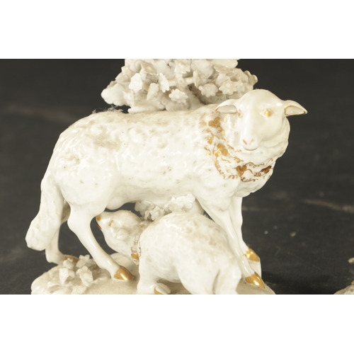 93 - A PAIR OF LATE 18TH CENTURY DERBY PORCELAIN SHEEP GROUPS, including a ram and ewe with lambs with gi... 