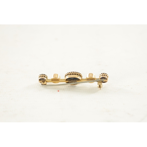 445 - A 9CT GOLD SAPPHIRE AND PEARL BAR BROOCH, total weight app. 5.5g. (Centre stone measures 11mm by 8mm... 