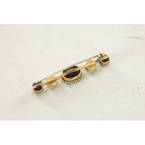 445 - A 9CT GOLD SAPPHIRE AND PEARL BAR BROOCH, total weight app. 5.5g. (Centre stone measures 11mm by 8mm... 